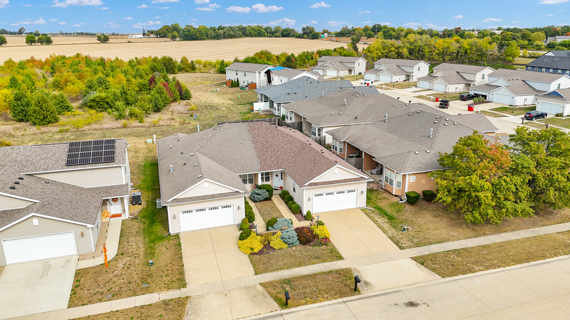1504 Stonebluff Court, Unit 1504 Champaign, IL 61822 - Photo 37 of 40 an aerial view of residential houses with outdoor space