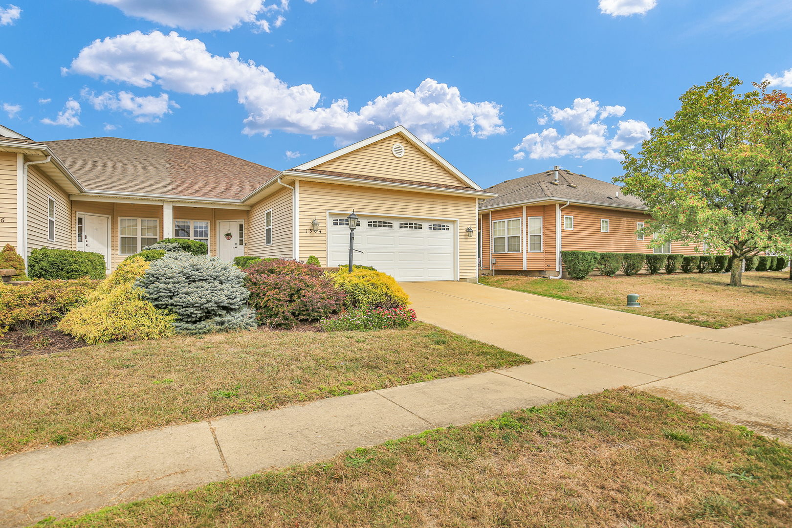 1504 Stonebluff Court, Unit 1504 Champaign, IL 61822 - Photo 4 of 40 a house with a outdoor space