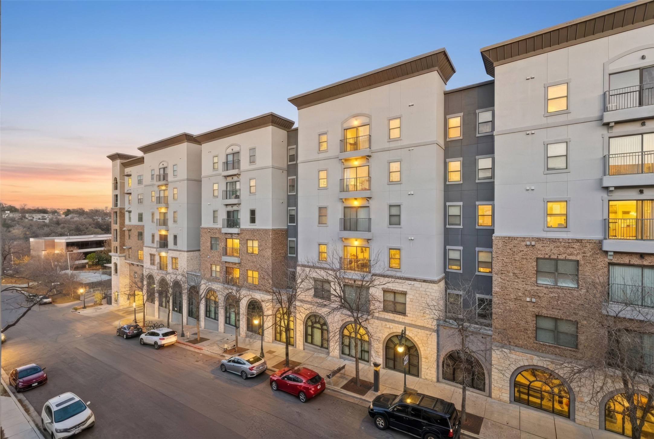 2500 Longview Street, Unit 418 Austin, TX 78705 - Photo 11 of 40 Property at dusk featuring a view of apartment building / complex