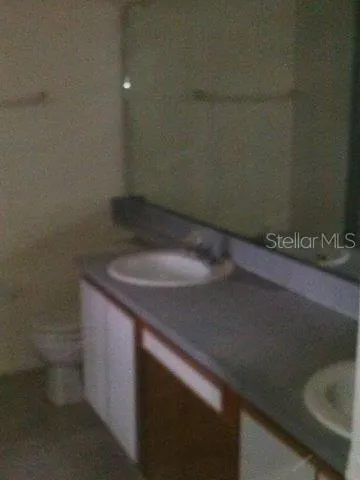 a view of a house with a yard and garage