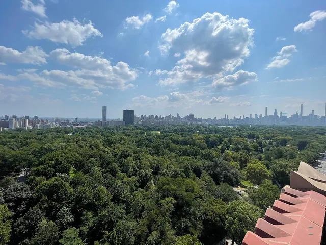 a view of a chairs and table in a patio