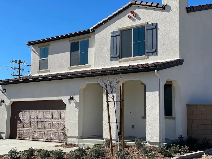 722 South Marcella Avenue Rialto, CA 92376 - Photo 1 of 1 a front view of a house with windows