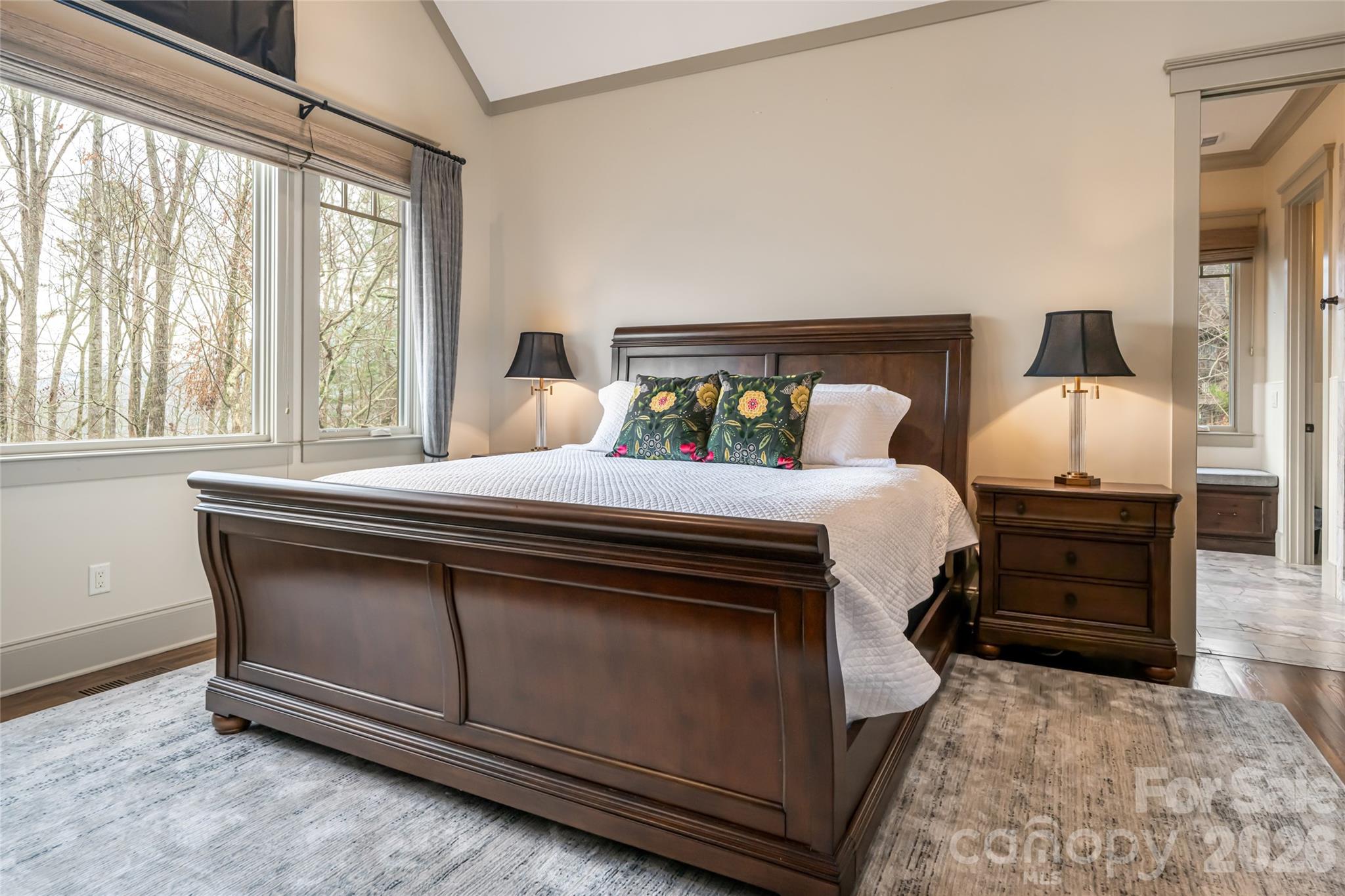 2 Cherokee Orchard Court Fairview, NC 28730 - Photo 21 of 47 a bedroom with a bed and a large window