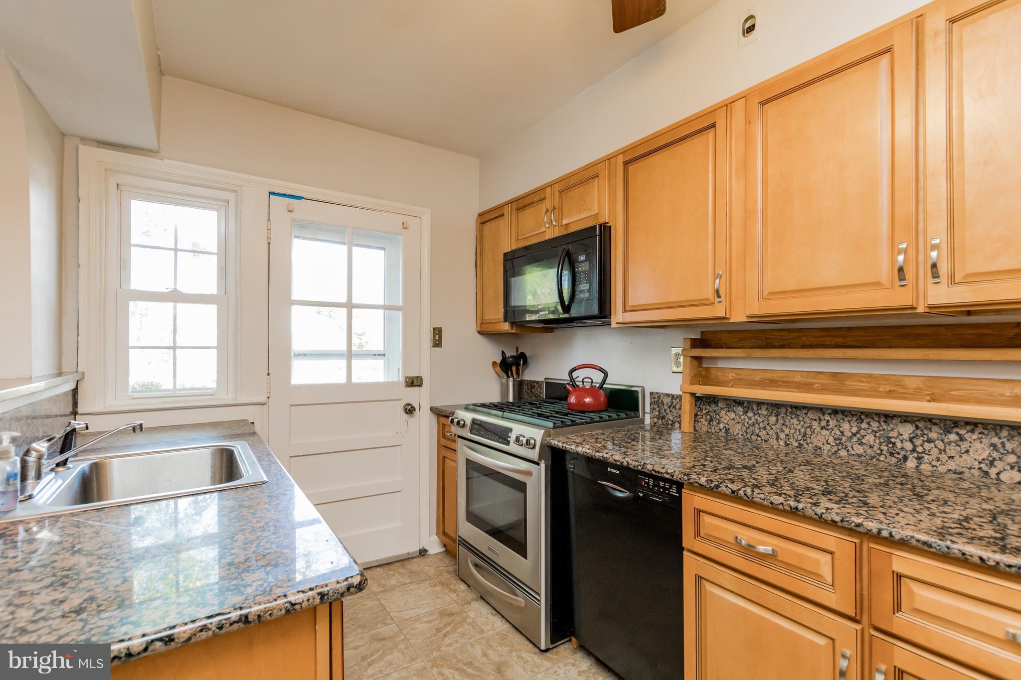1879 Edgewood Road Baltimore, MD 21286 - Photo 8 of 30 Granite, stainless steel appliances, ceramic tile