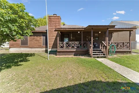 a view of a house with entertaining space