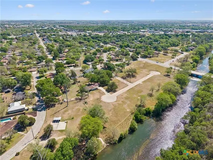 an aerial view of a city with lots of residential buildings