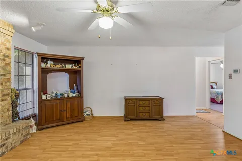 a view of a livingroom with a staircase