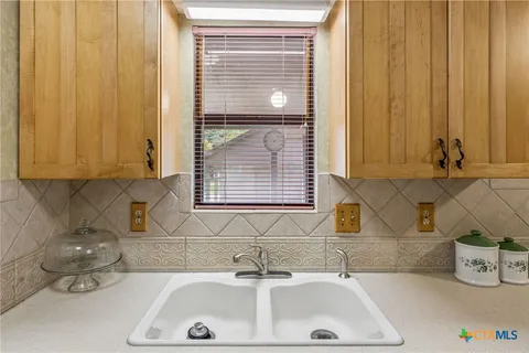a bathroom with a sink and a bathtub