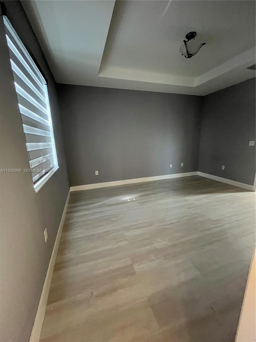 23218 Southwest 113 Passage Homestead, FL 33032 - Photo 10 of 23 a view of an empty room and window