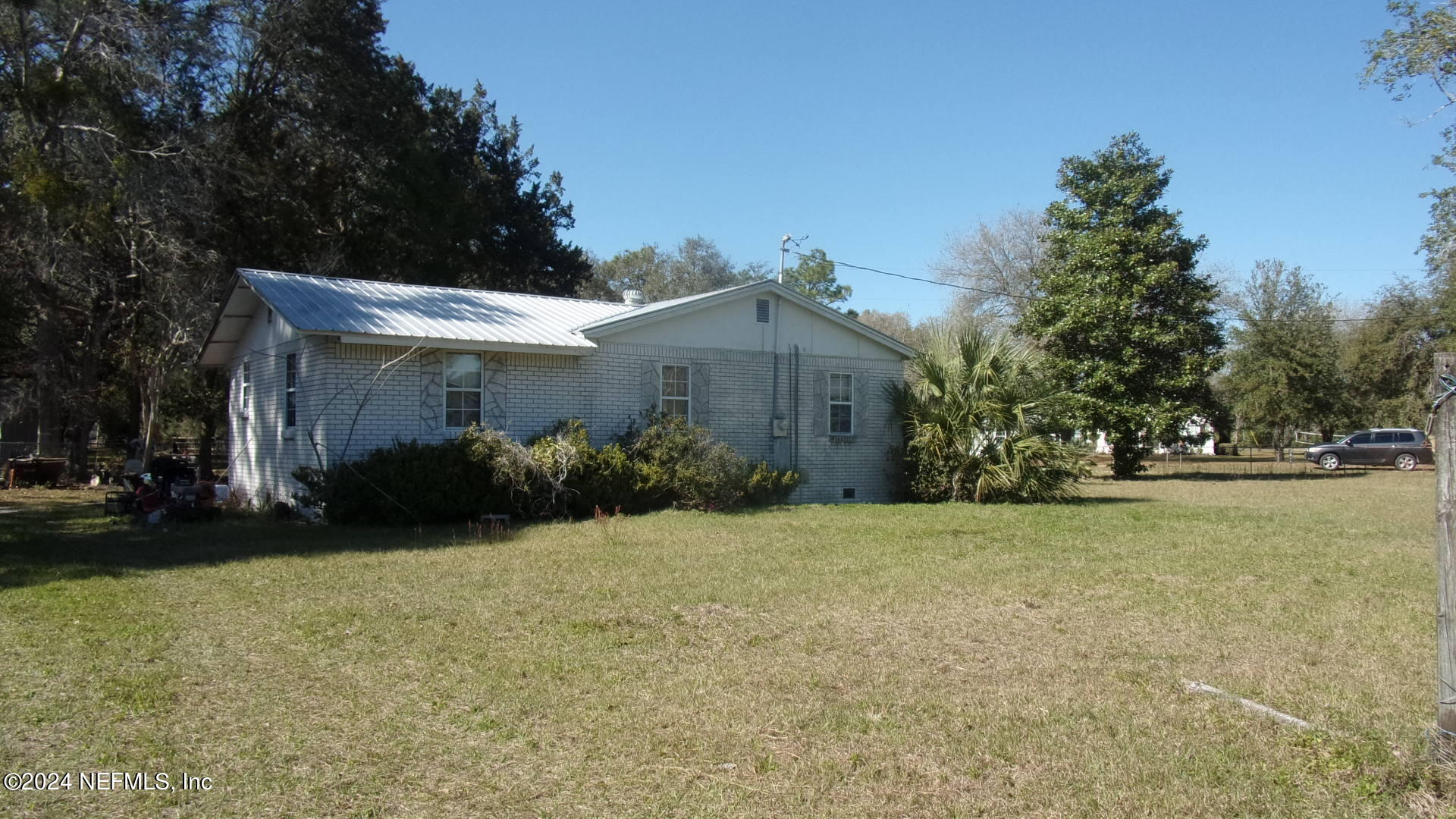 117 Odom Road Palatka, FL 32177 - Photo 16 of 20 a view of a house with a backyard