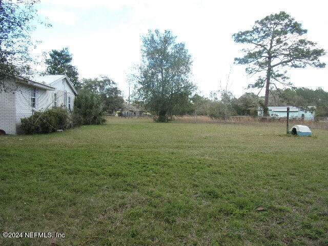 117 Odom Road Palatka, FL 32177 - Photo 8 of 20 a view of outdoor space with deck and yard