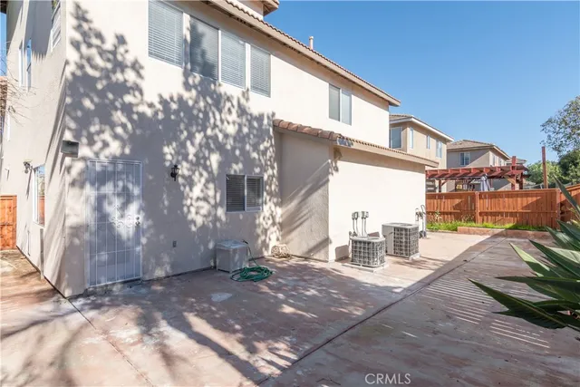 a view of a house with a patio