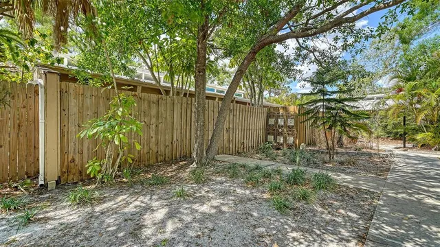a view of a backyard of the house