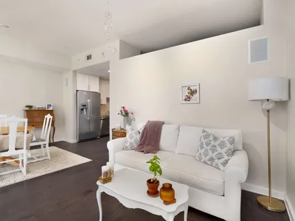 a living room with furniture and a couch