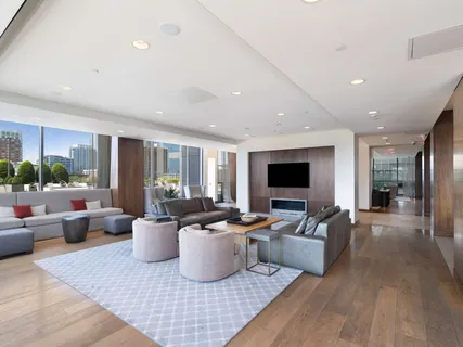 a outdoor space with lots of tables a garden and chairs