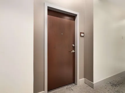 a view of a hallway with closet