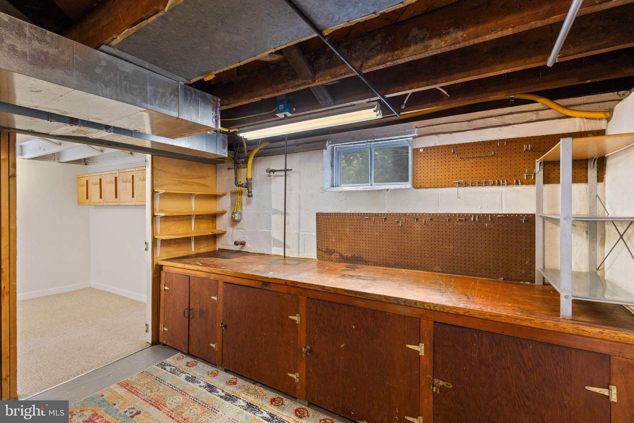 1326 Brook Road Baltimore, MD 21228 - Photo 27 of 35 a kitchen with a sink and cabinets