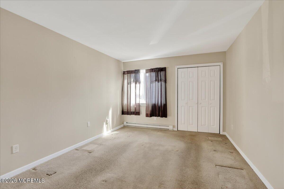 330 Shore Drive, Unit E2 Highlands, NJ 07732 - Photo 24 of 62 23-Primary Bedroom