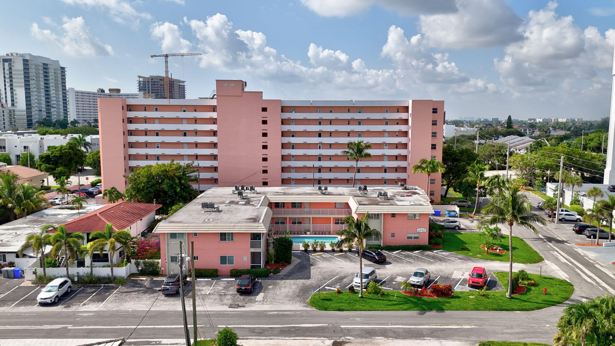 1450 North Riverside Drive, Unit 103 Pompano Beach, FL 33062 - Photo 23 of 34 a front view of building with yard