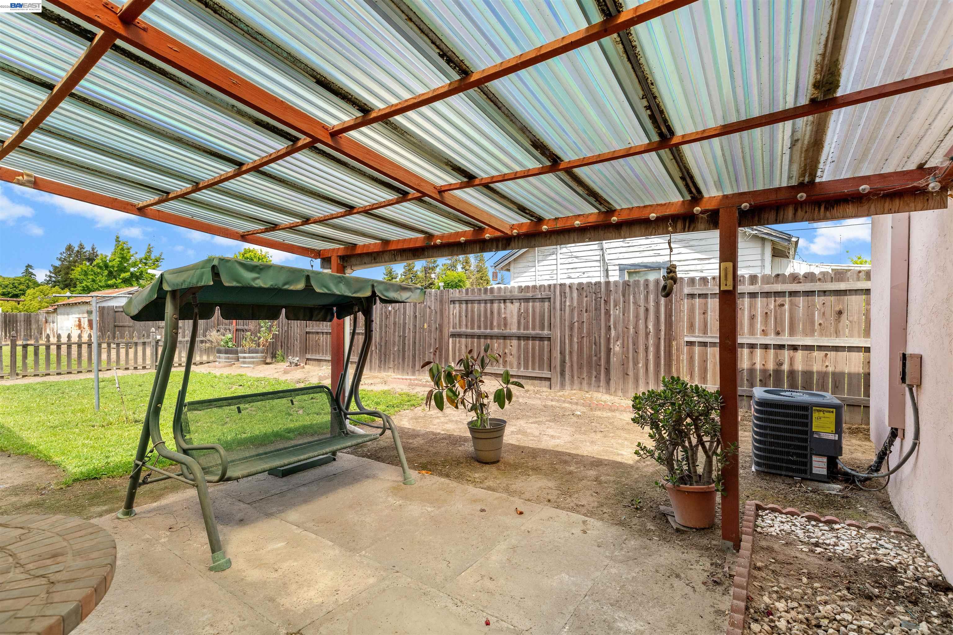 953 Thomsen Road Lathrop, CA 95330 - Photo 28 of 49 a view of a swimming pool with a patio