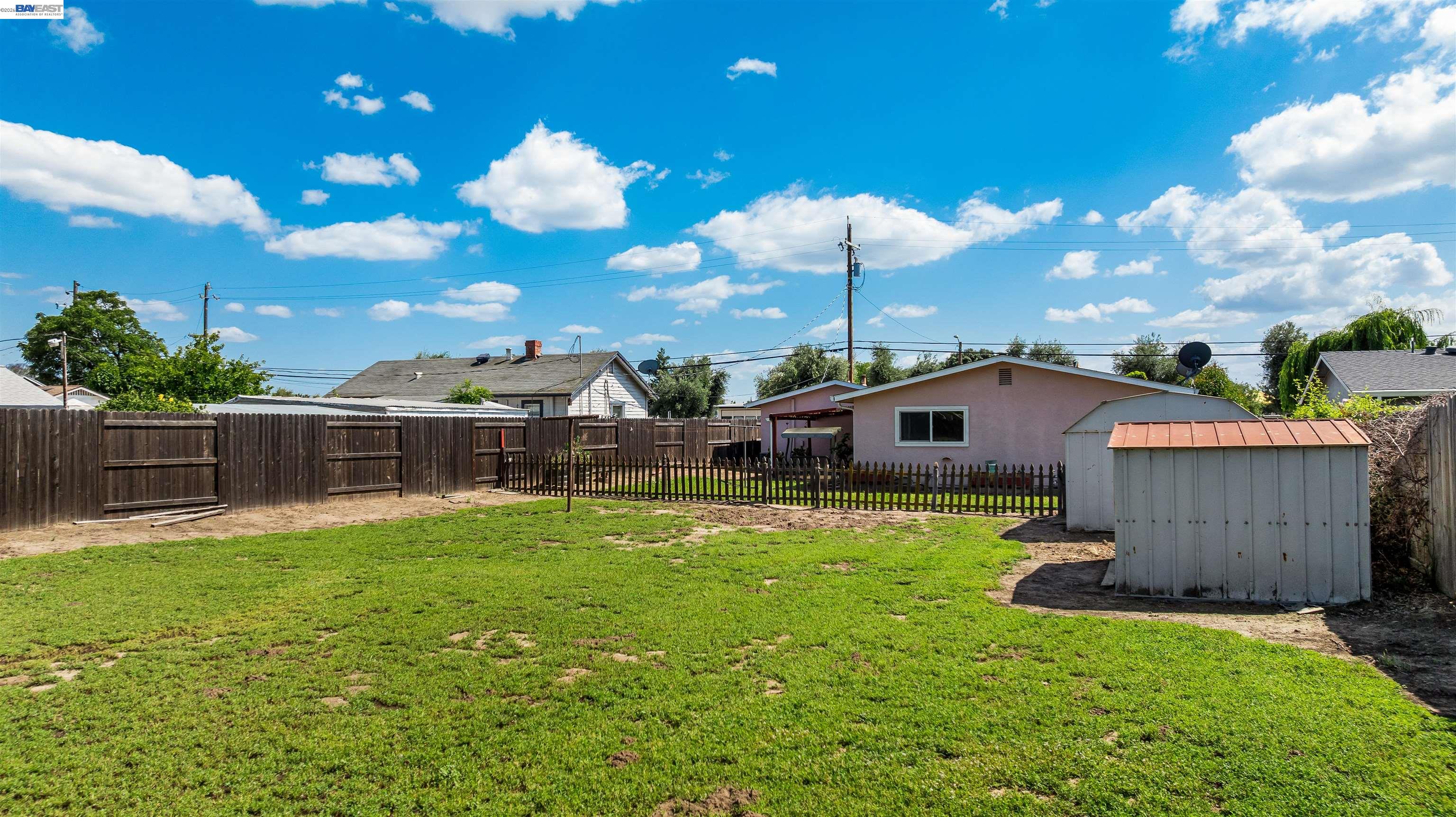 953 Thomsen Road Lathrop, CA 95330 - Photo 37 of 49 a front view of a house with garden