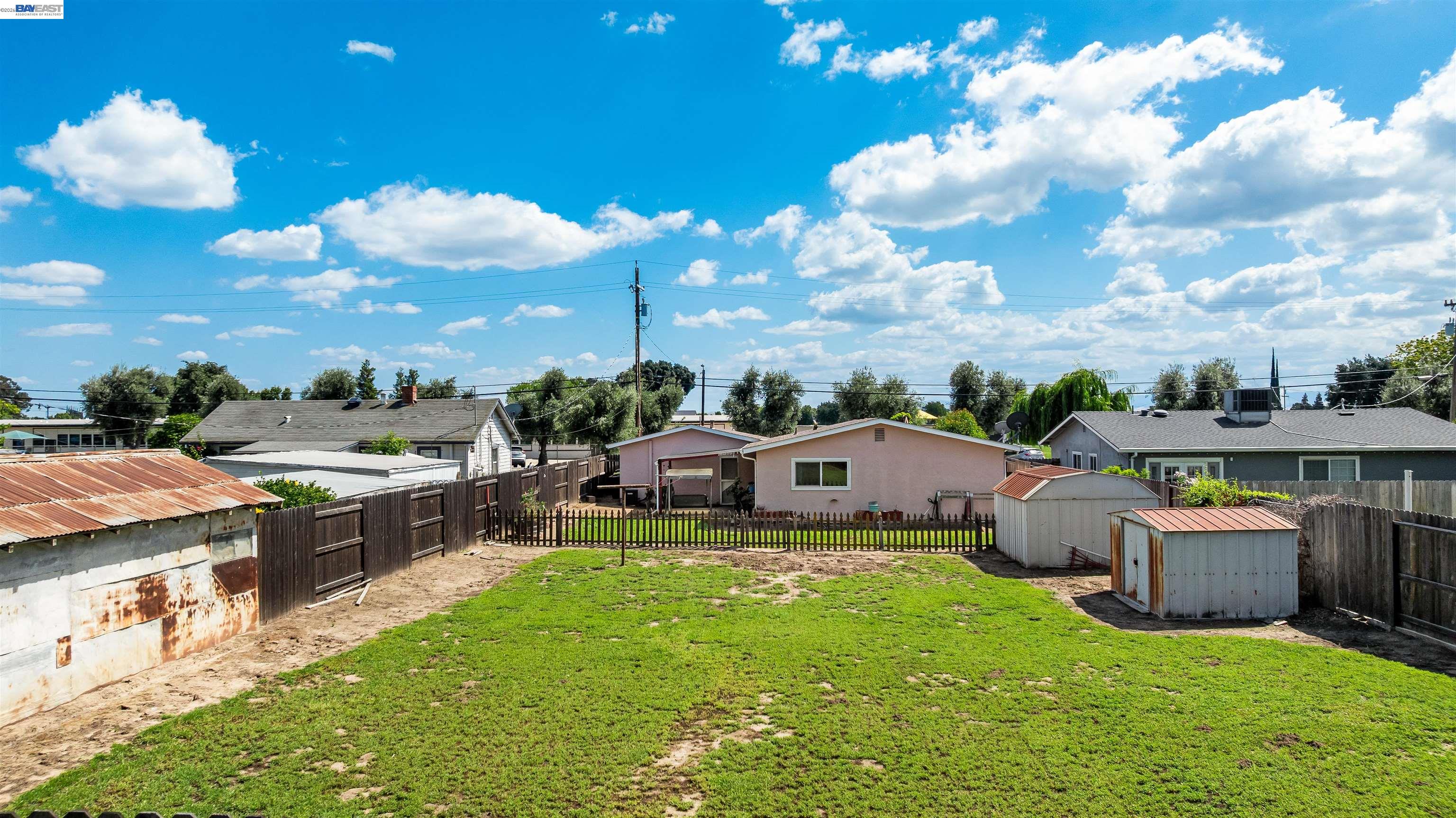 953 Thomsen Road Lathrop, CA 95330 - Photo 38 of 49 a view of a house with a backyard