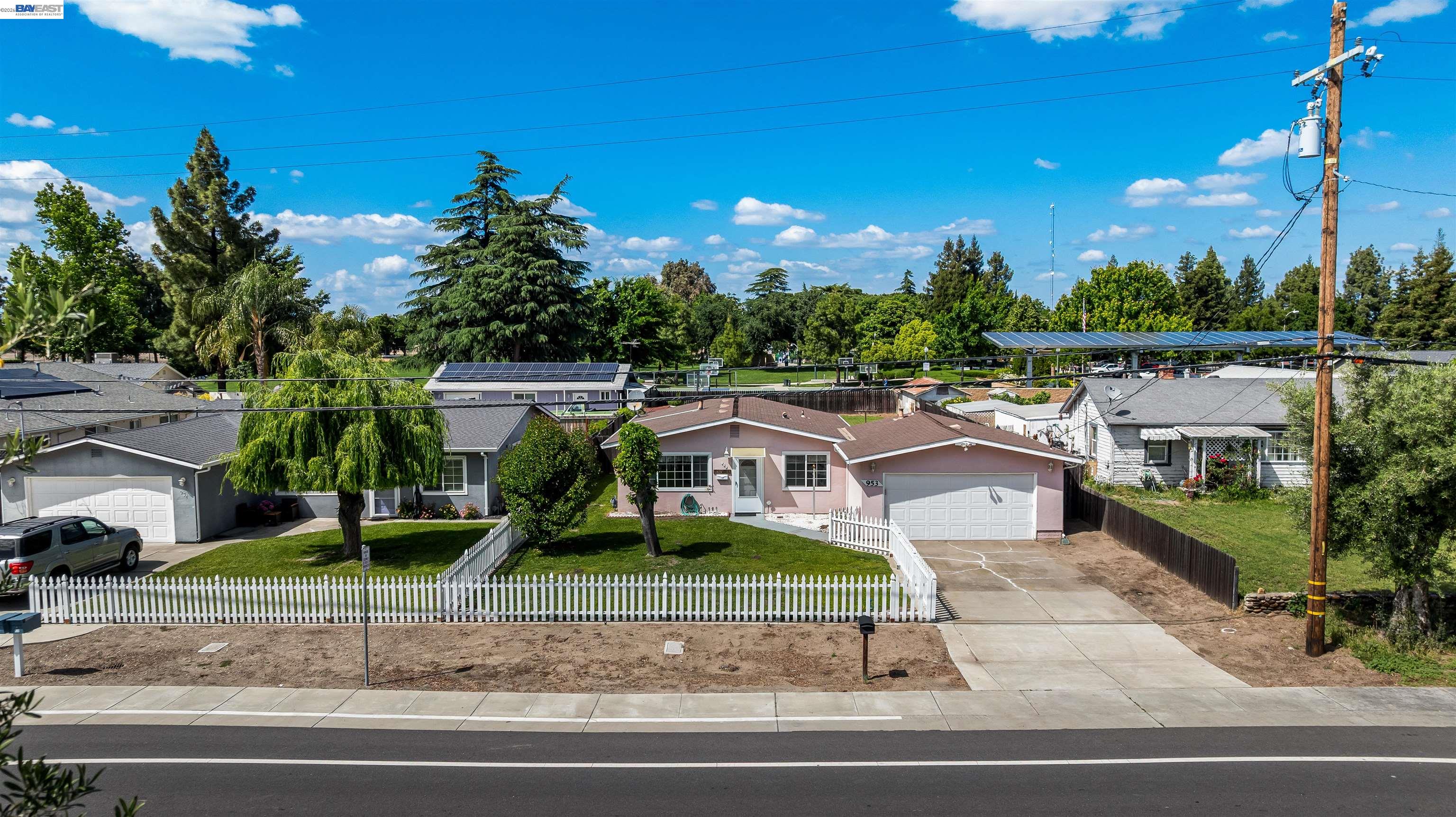 953 Thomsen Road Lathrop, CA 95330 - Photo 4 of 49 a view of a house with a yard