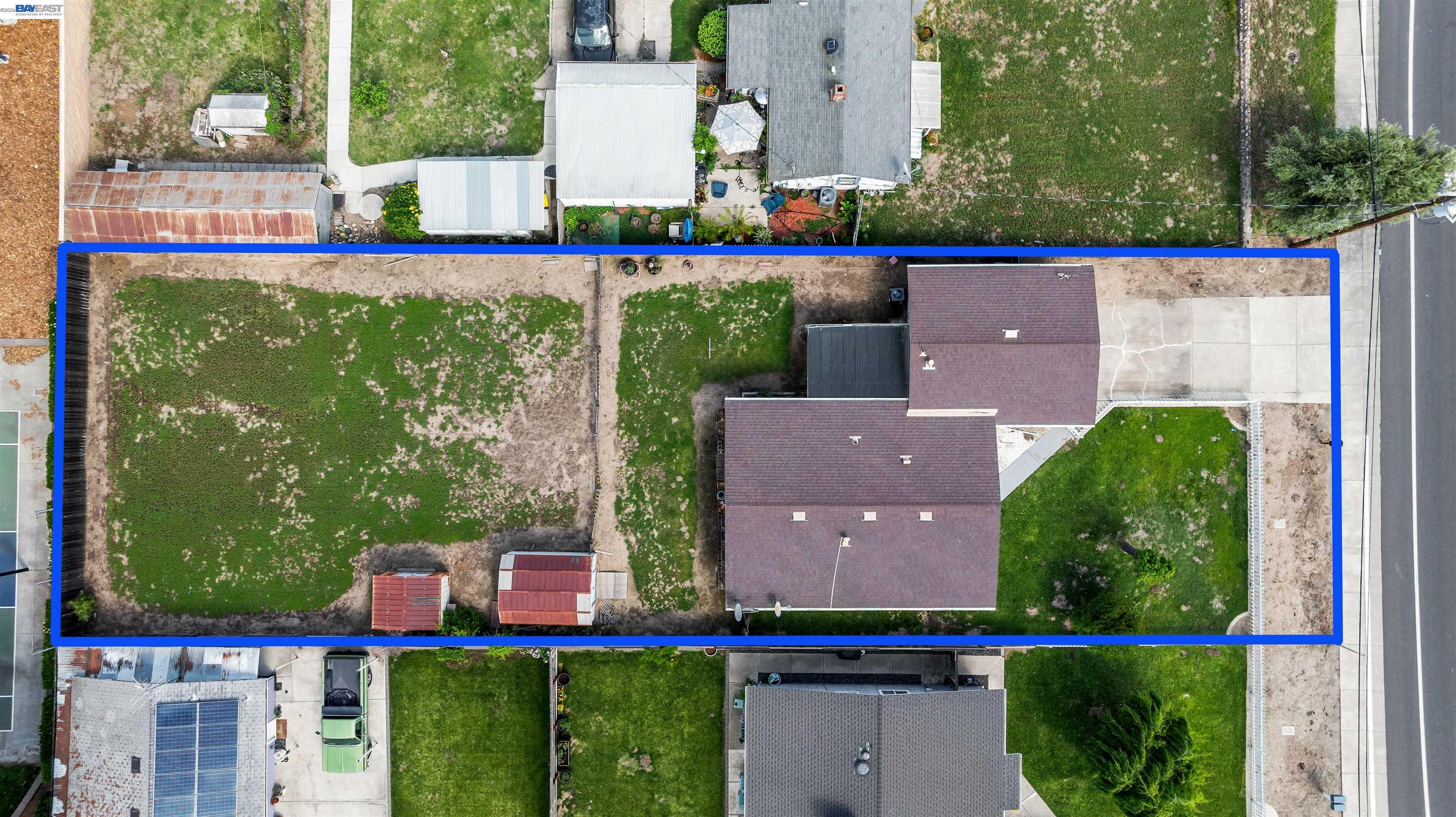 953 Thomsen Road Lathrop, CA 95330 - Photo 41 of 49 an aerial view of a house with a garden and trees
