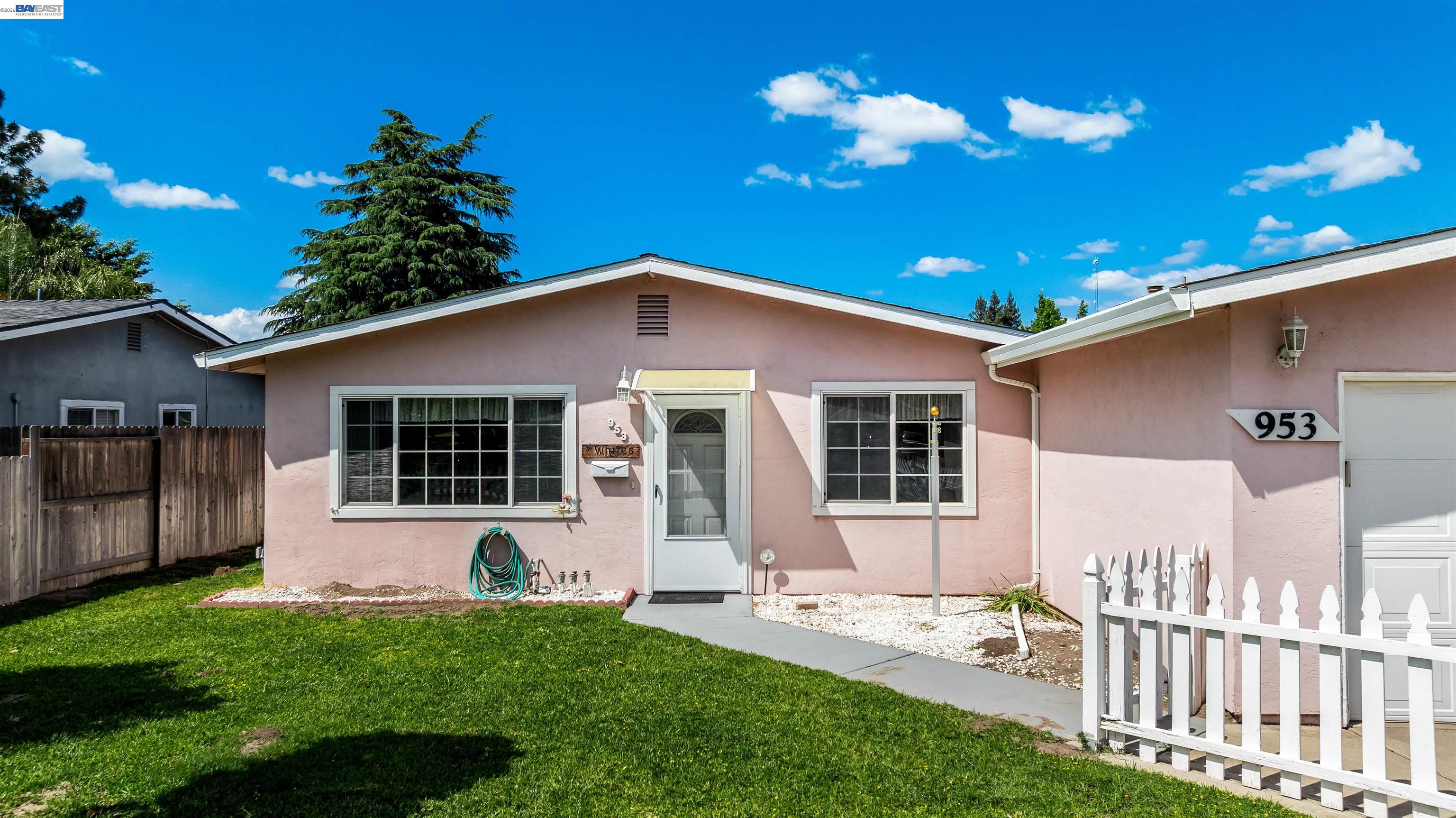 953 Thomsen Road Lathrop, CA 95330 - Photo 5 of 49 front view of a house with a yard