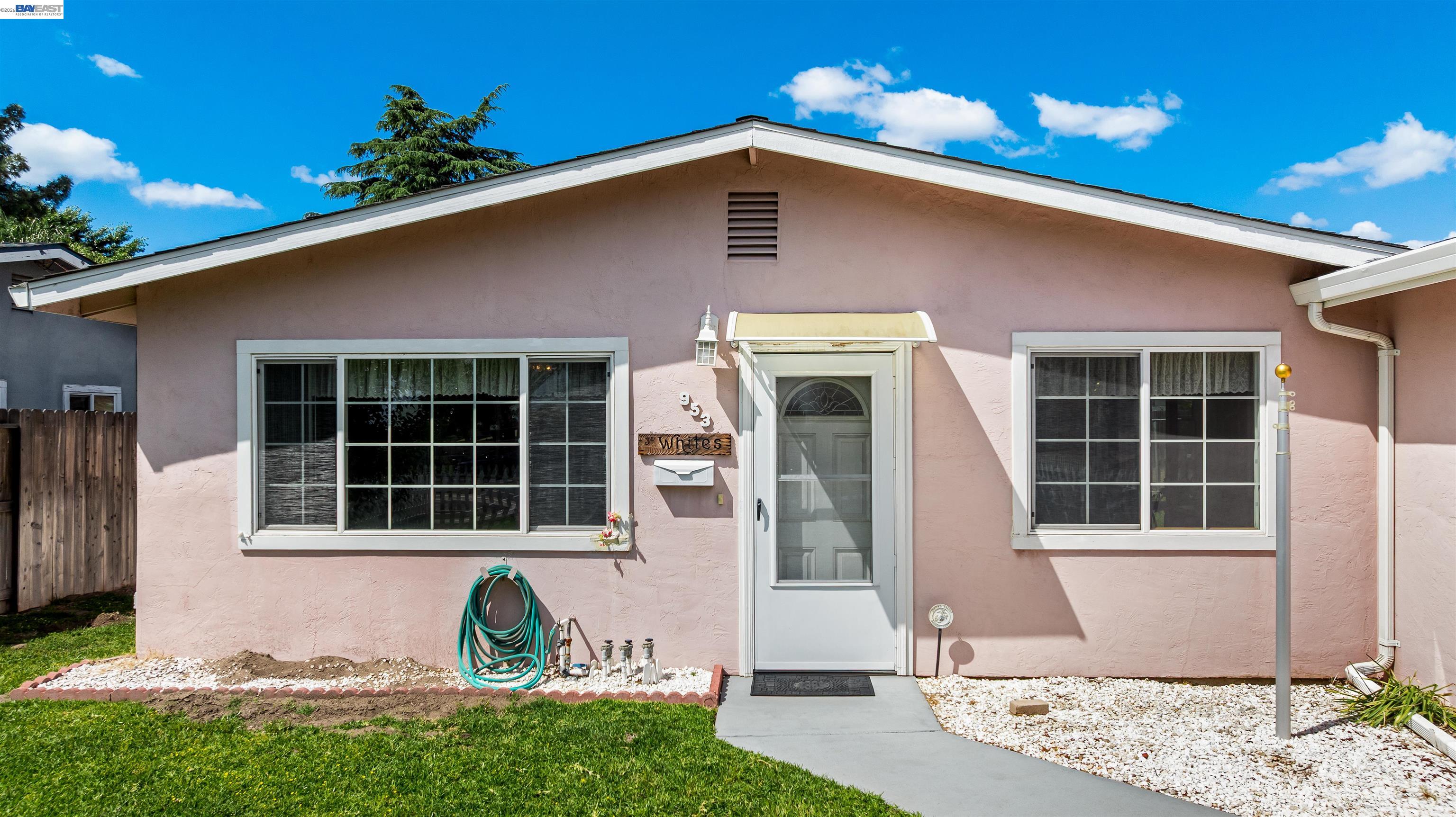 953 Thomsen Road Lathrop, CA 95330 - Photo 6 of 49 a front view of a house with a yard