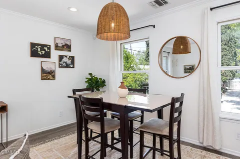 a view of a backyard with sitting area and furniture