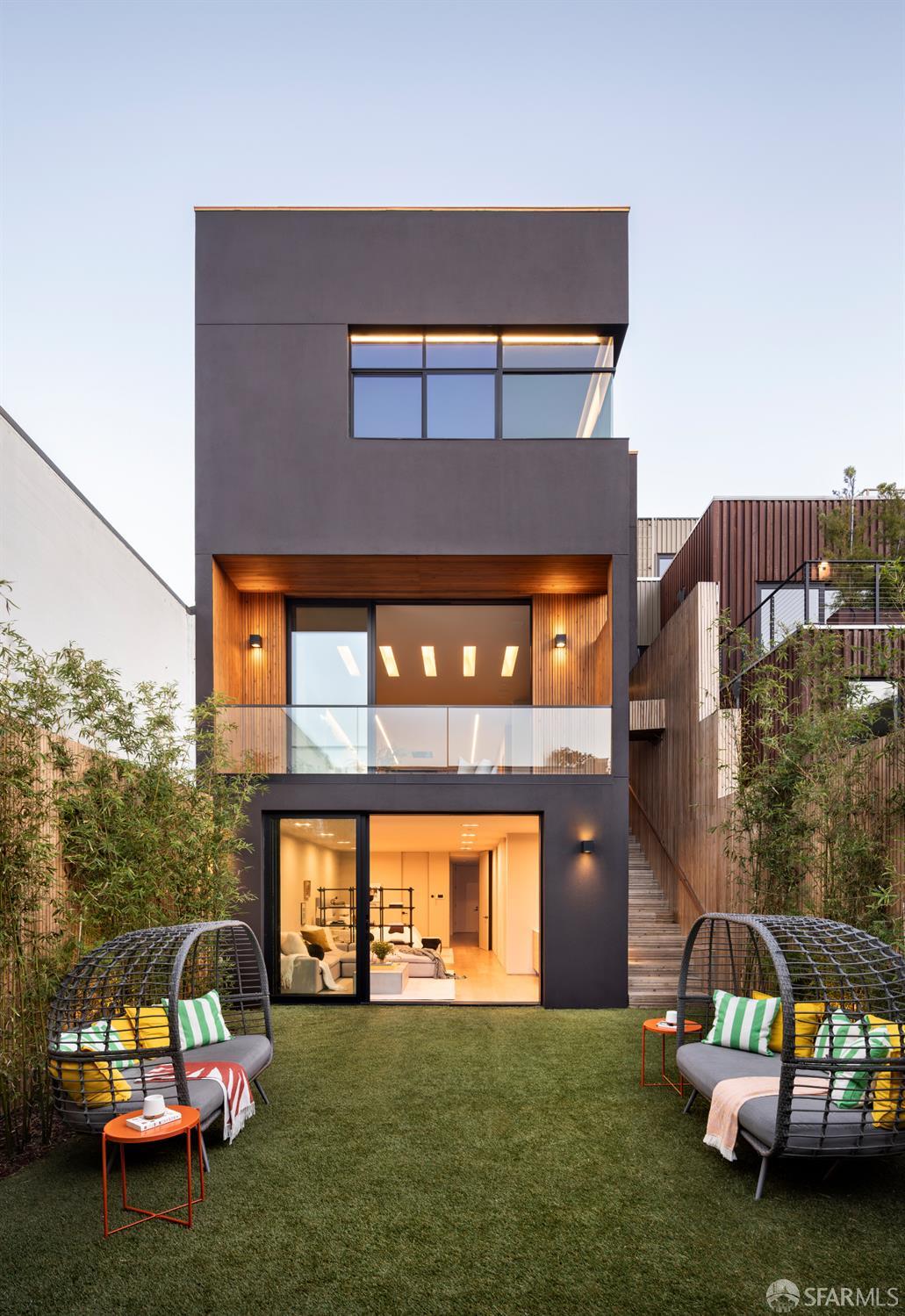 1864 Greenwich Street San Francisco, CA 94123 - Photo 2 of 27 a front view of a house with a garden and trees