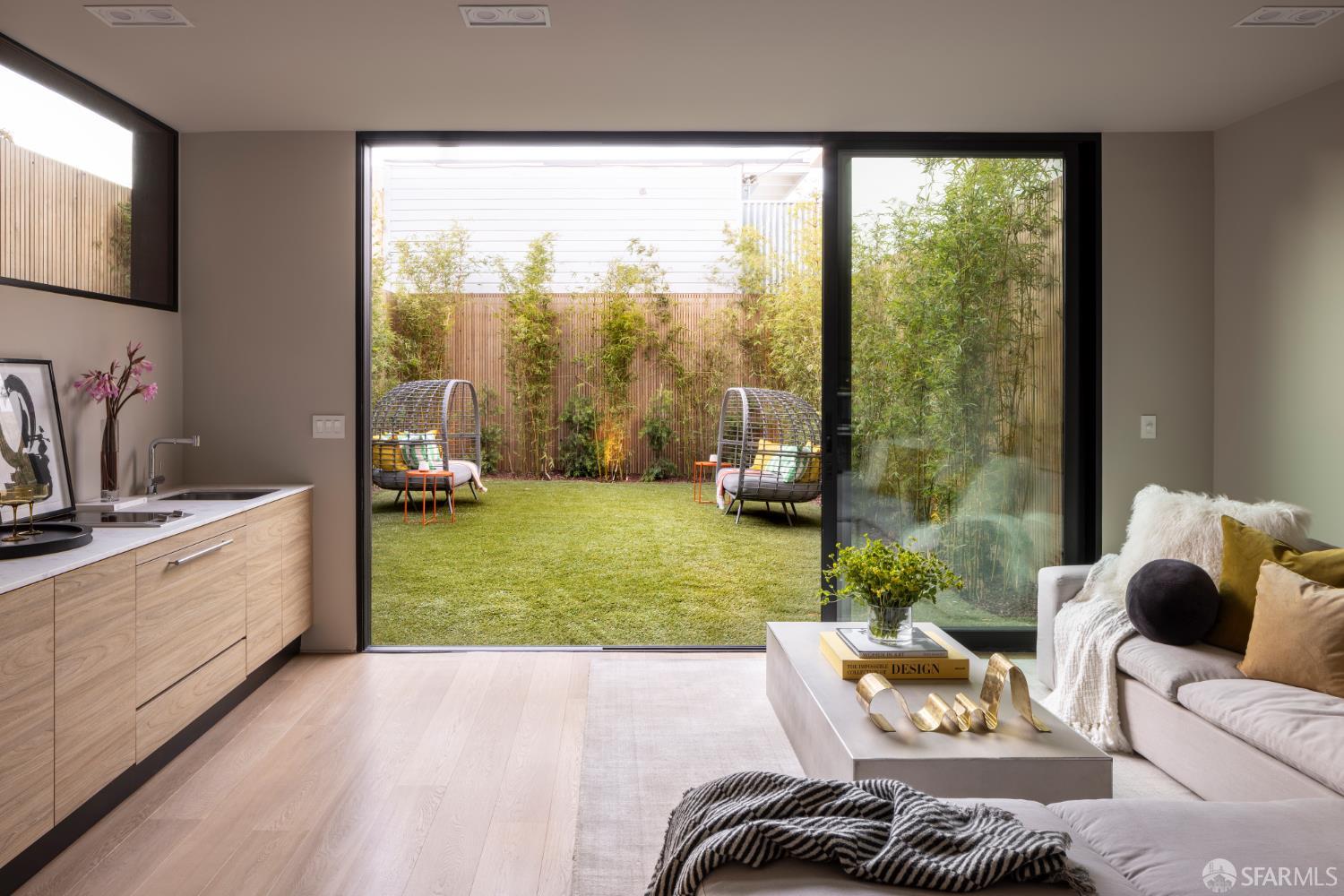 1864 Greenwich Street San Francisco, CA 94123 - Photo 26 of 27 a bedroom with furniture and a large window