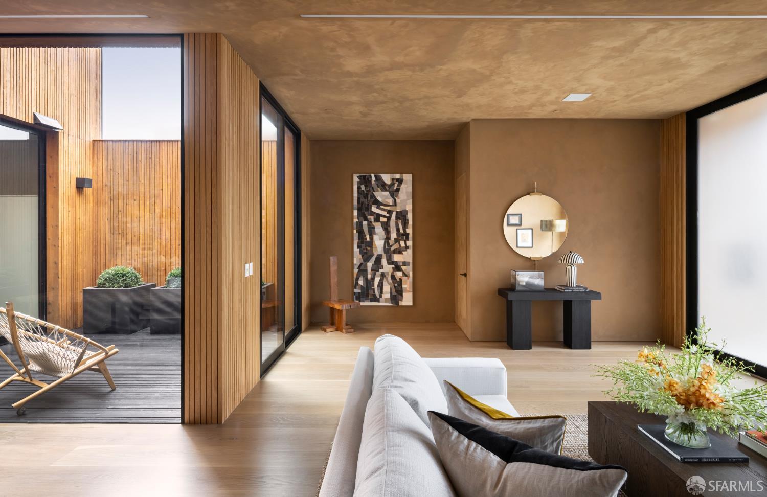 1864 Greenwich Street San Francisco, CA 94123 - Photo 3 of 27 a bedroom with furniture and a large mirror