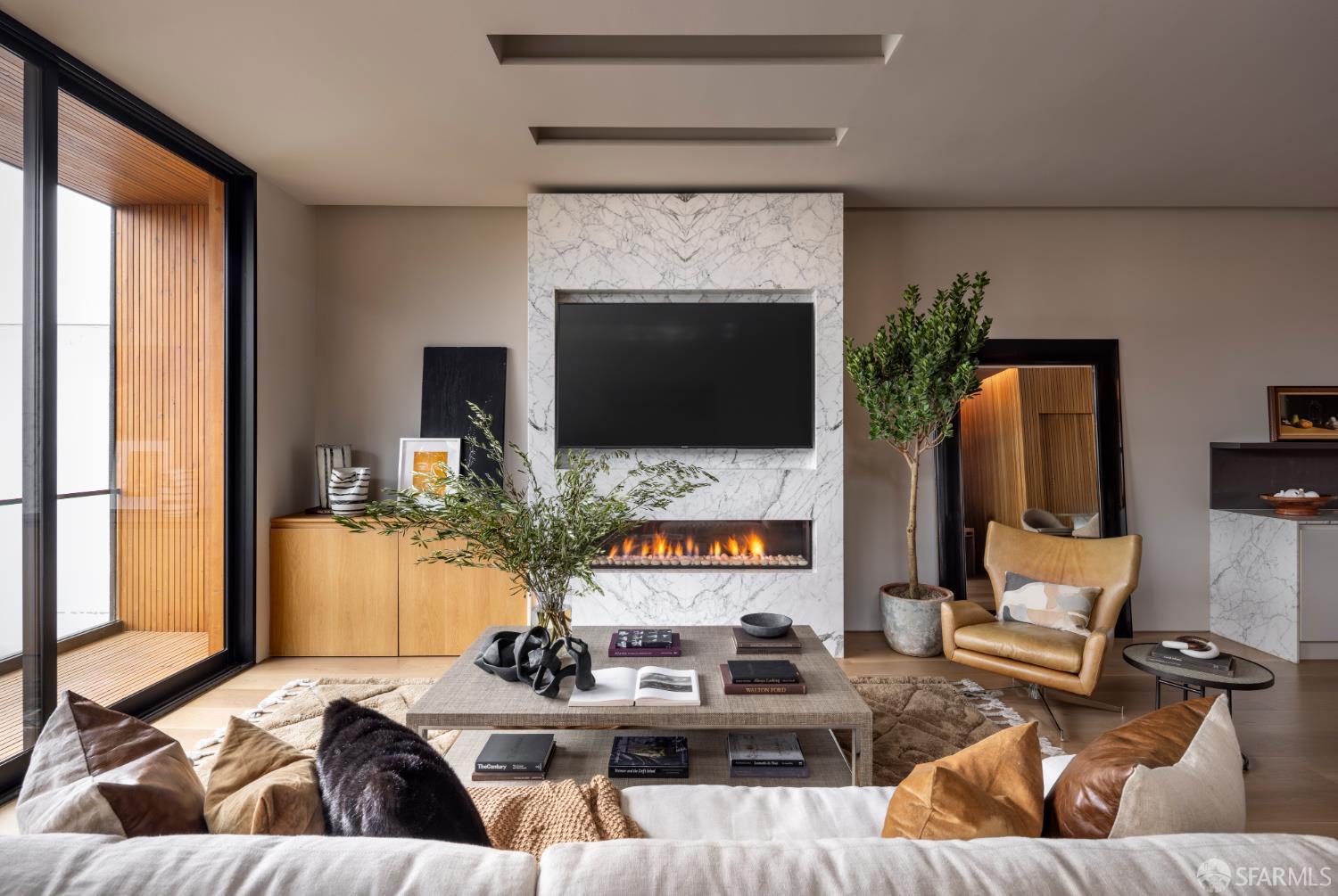 1864 Greenwich Street San Francisco, CA 94123 - Photo 8 of 27 a living room with furniture and a flat screen tv