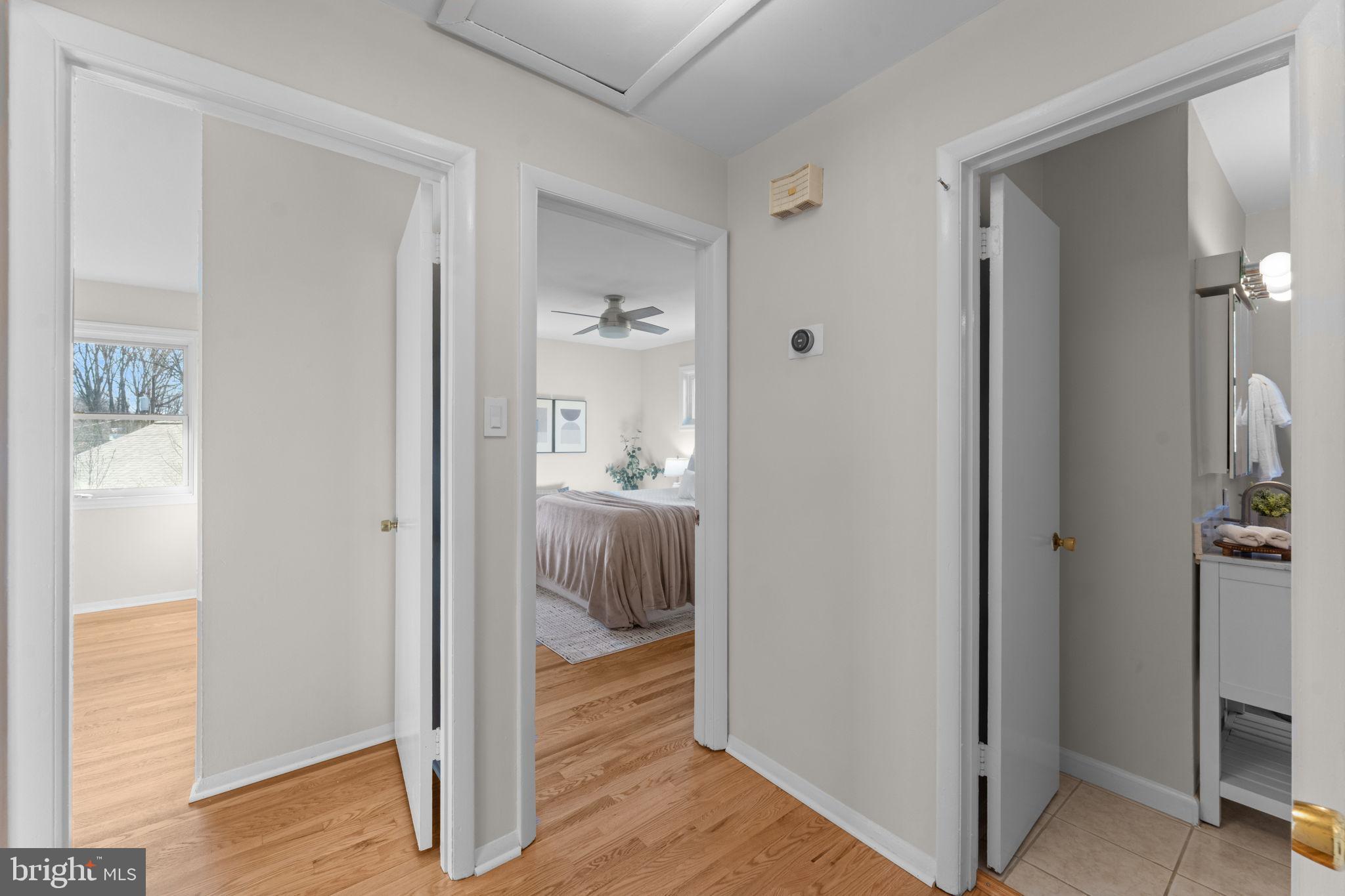 7448 Long Pine Drive Springfield, VA 22151 - Photo 14 of 40 a view of a bathroom from a hallway