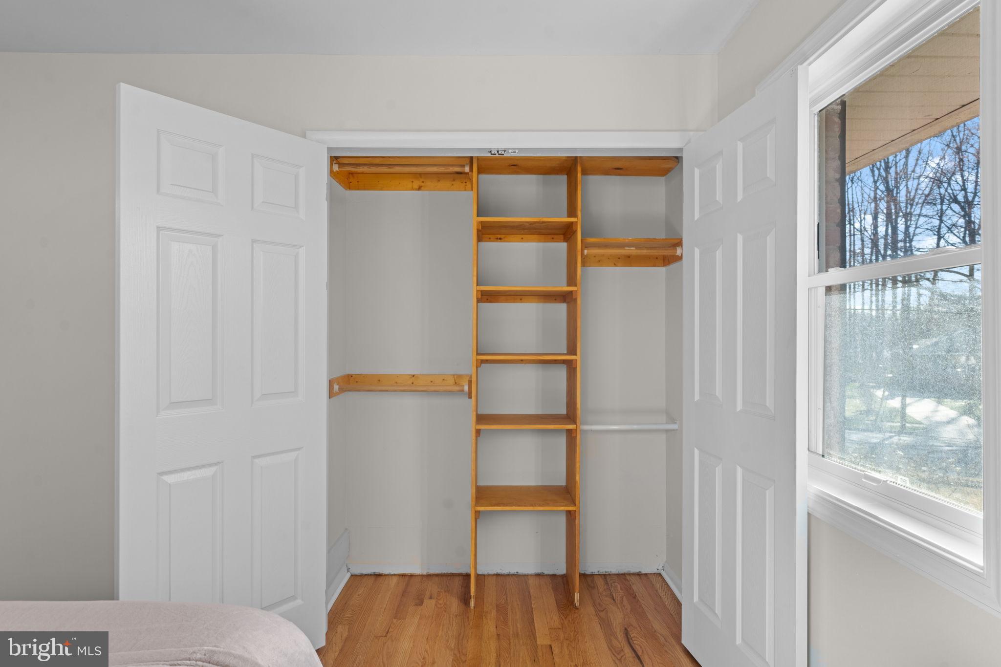 7448 Long Pine Drive Springfield, VA 22151 - Photo 18 of 40 a bedroom with a bed and a window