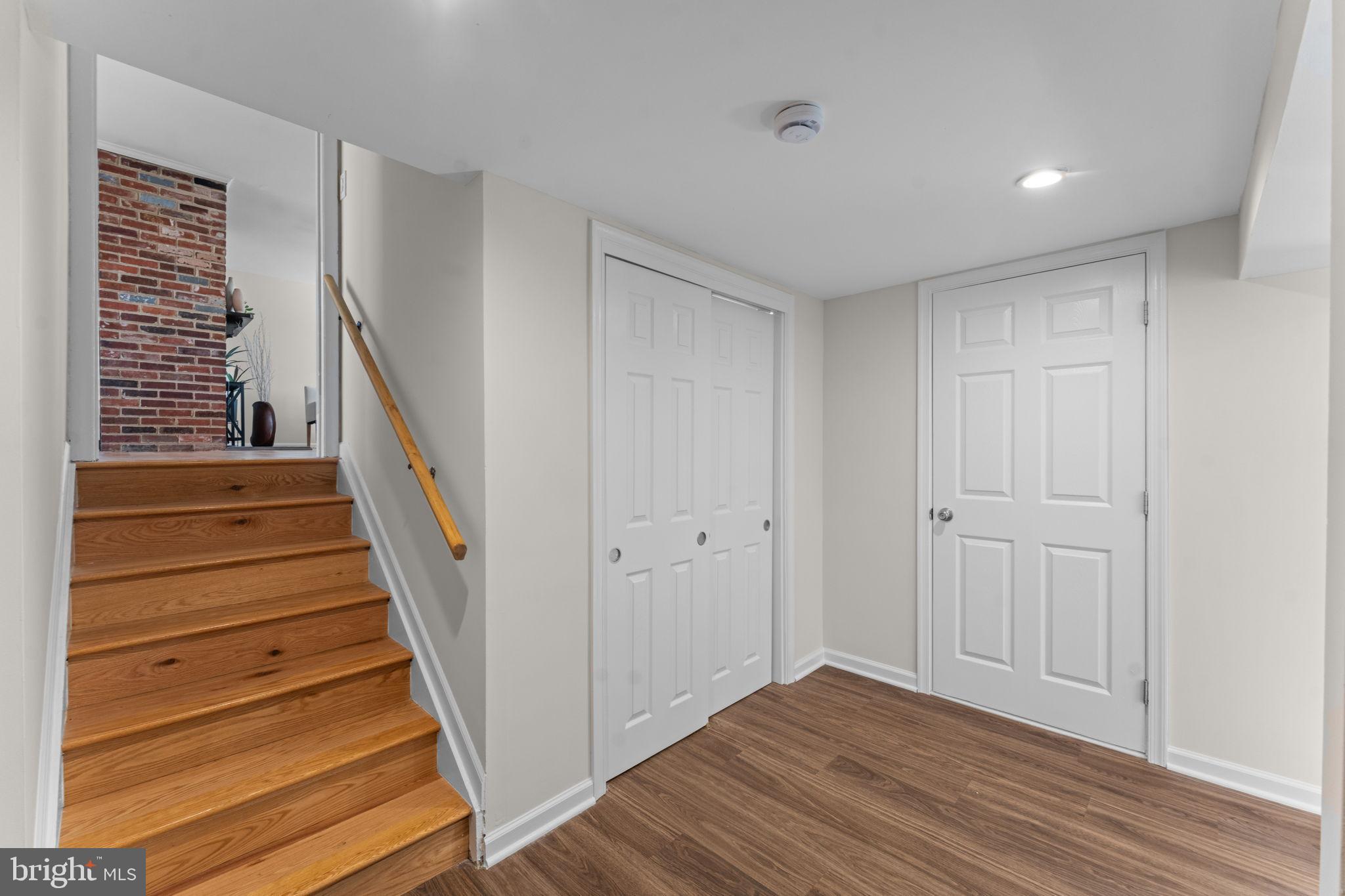 7448 Long Pine Drive Springfield, VA 22151 - Photo 25 of 40 a view of a hallway with wooden floor and entryway