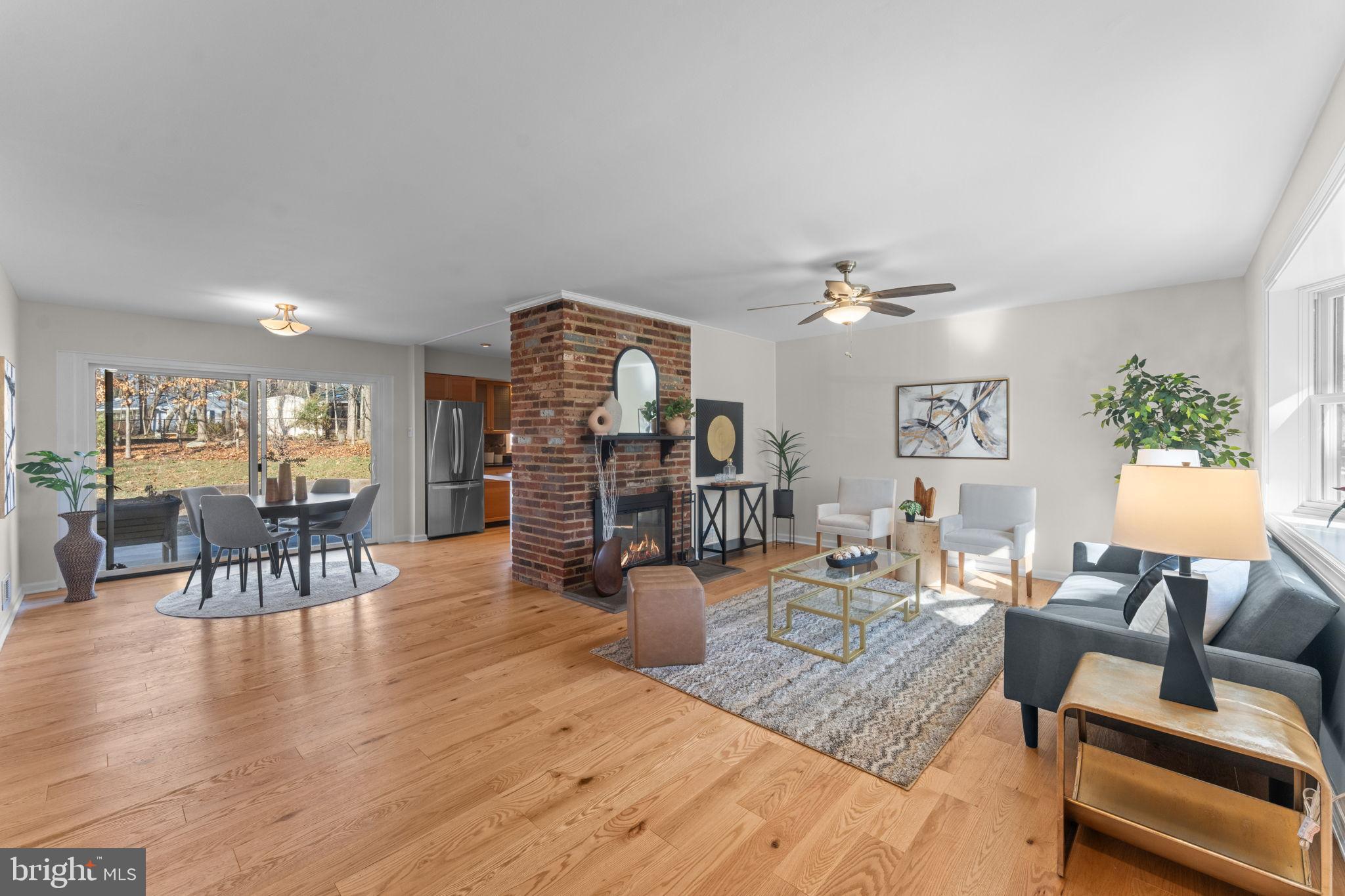 7448 Long Pine Drive Springfield, VA 22151 - Photo 4 of 40 a living room with furniture and wooden floor