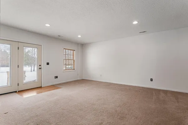 an empty room with an entryway