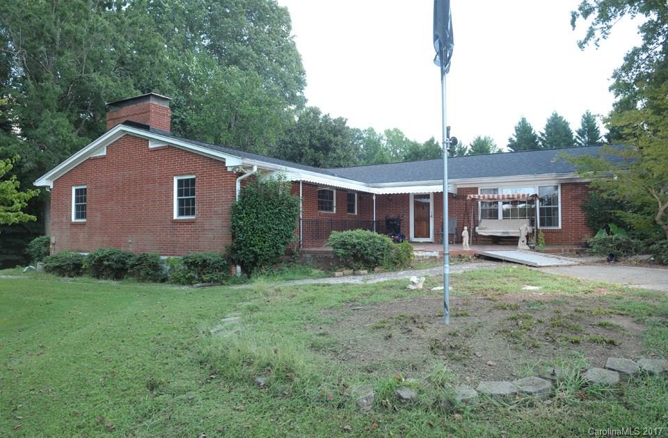 7135 Pop Basinger Road Salisbury, NC 28146 - Photo 1 of 23 a house view with a garden space