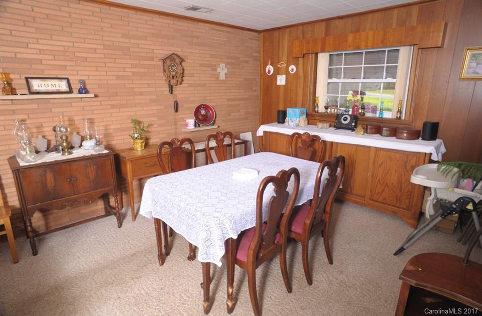 7135 Pop Basinger Road Salisbury, NC 28146 - Photo 14 of 23 a dining room with furniture and window