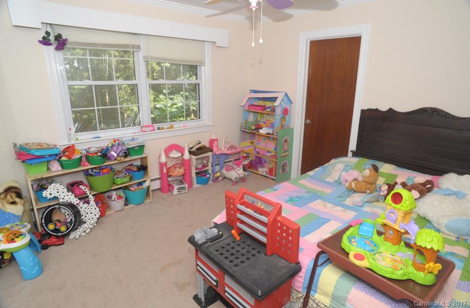 7135 Pop Basinger Road Salisbury, NC 28146 - Photo 15 of 23 a play room with toys