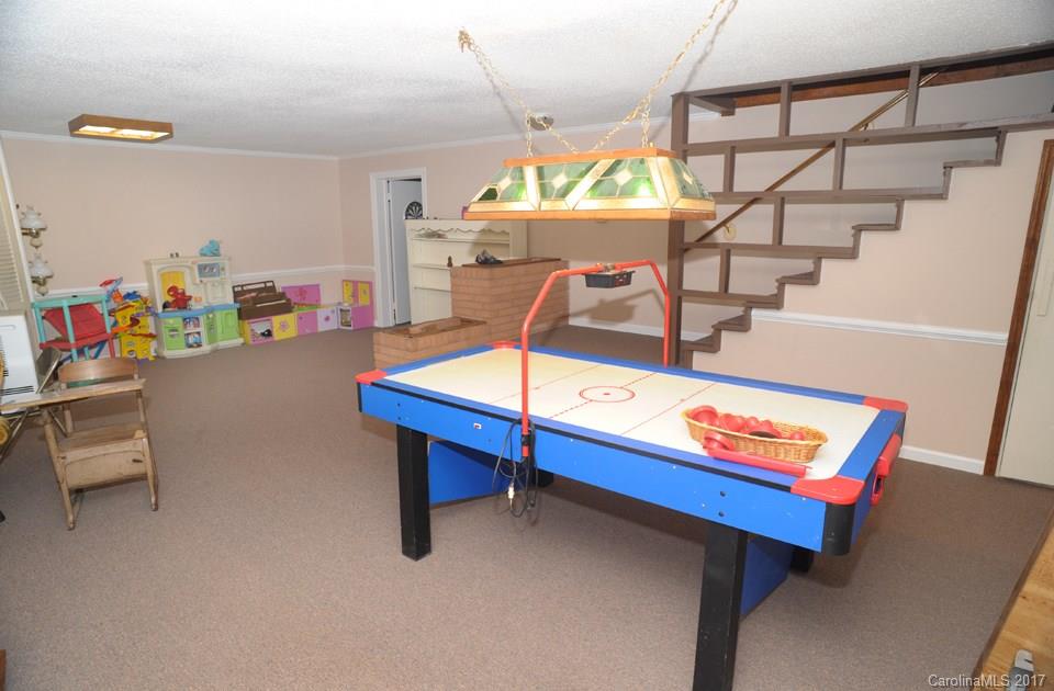 7135 Pop Basinger Road Salisbury, NC 28146 - Photo 18 of 23 a room with table and chairs