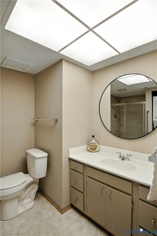 2956 Hathaway Road, Unit U102 Richmond, VA 23225 - Photo 15 of 37 a bathroom with a toilet sink and mirror