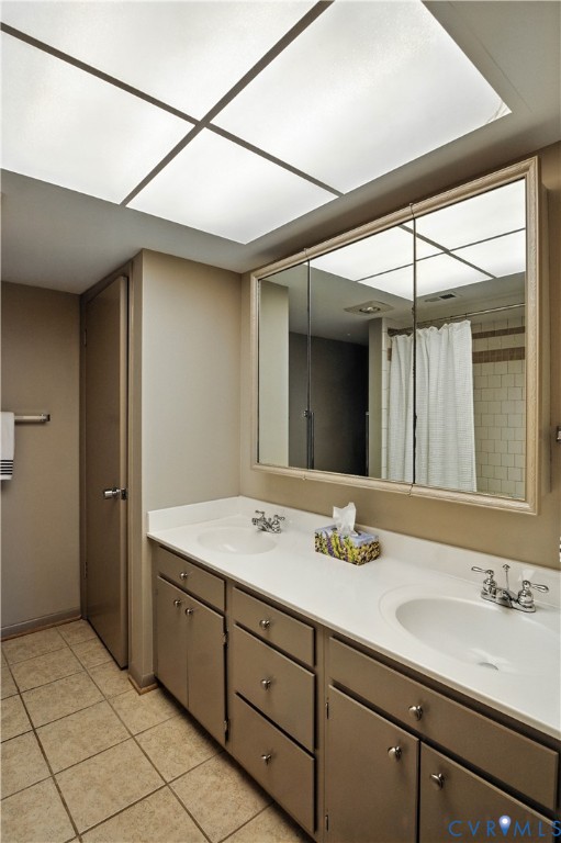 2956 Hathaway Road, Unit U102 Richmond, VA 23225 - Photo 23 of 37 a bathroom with a sink and a mirror