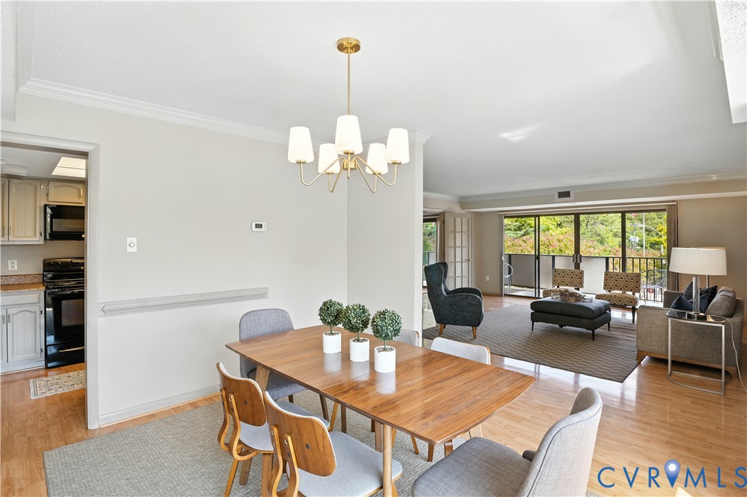 2956 Hathaway Road, Unit U102 Richmond, VA 23225 - Photo 6 of 37 Dining area featuring light wood-type flooring, a
