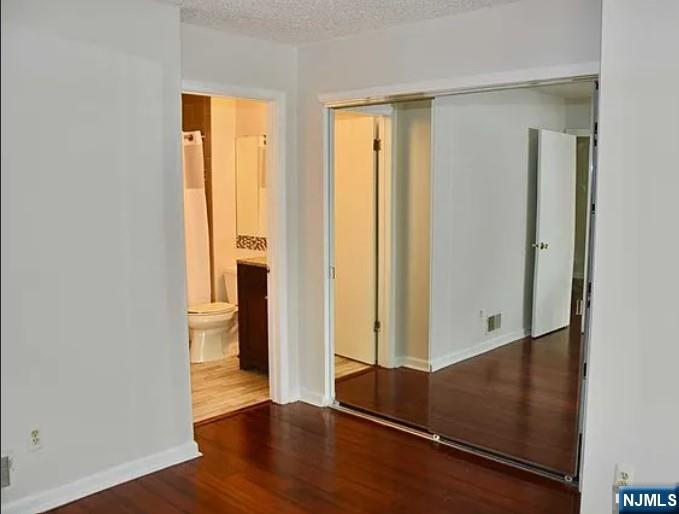 727 Pepperidge Road Mahwah, NJ 07430 - Photo 8 of 10 wooden floor in an empty room