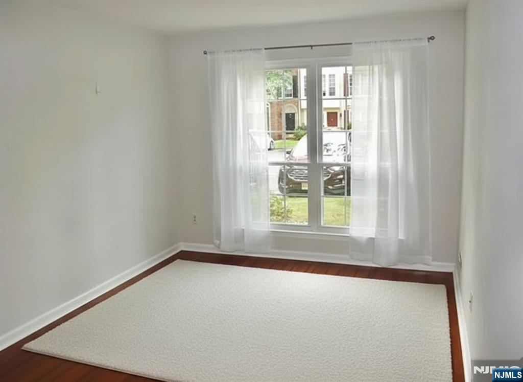 727 Pepperidge Road Mahwah, NJ 07430 - Photo 9 of 10 a view of an empty room with a window