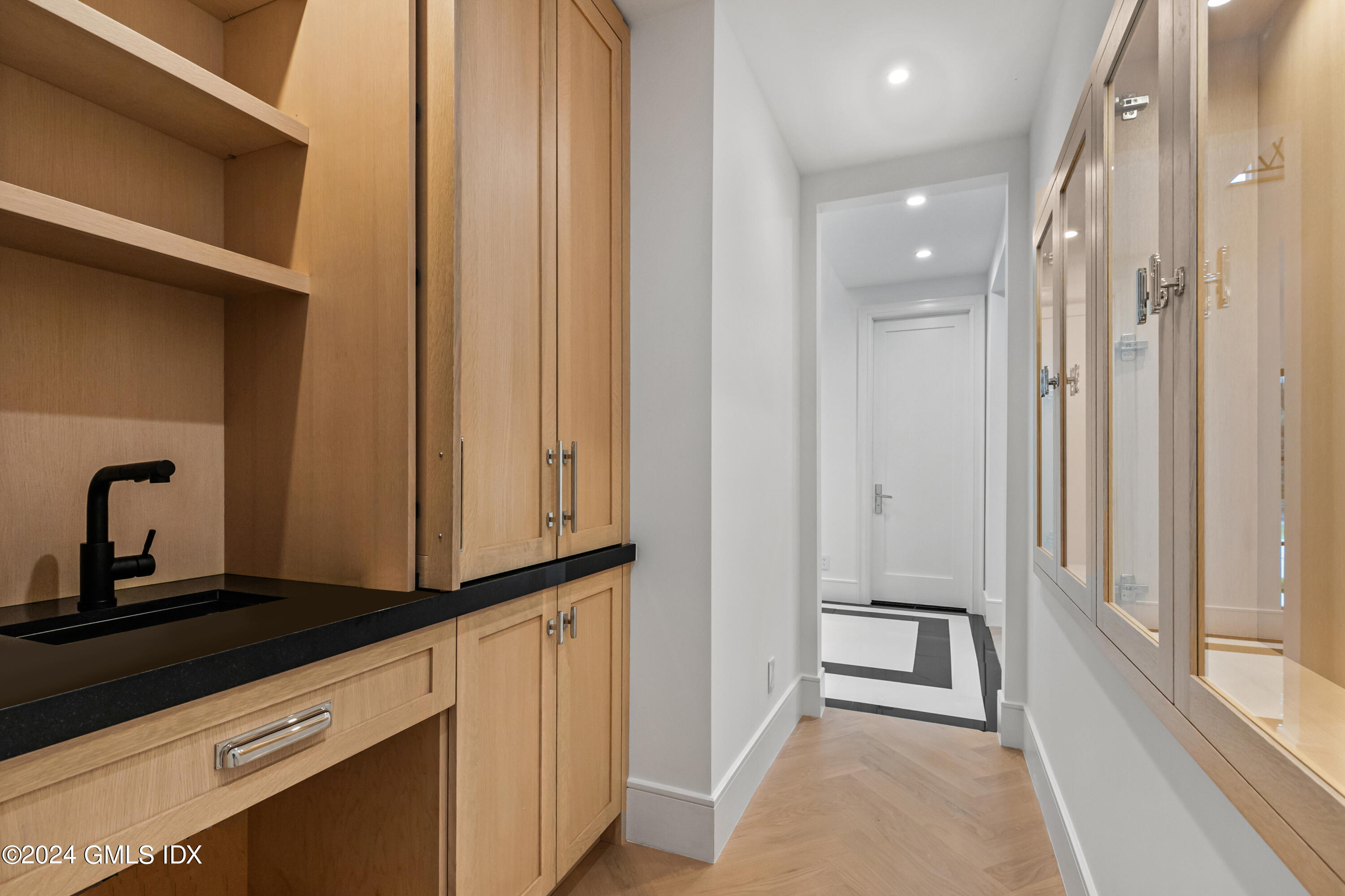 248 Round Hill Road Greenwich, CT 06831 - Photo 15 of 49 a view of a hallway with washer and dryer